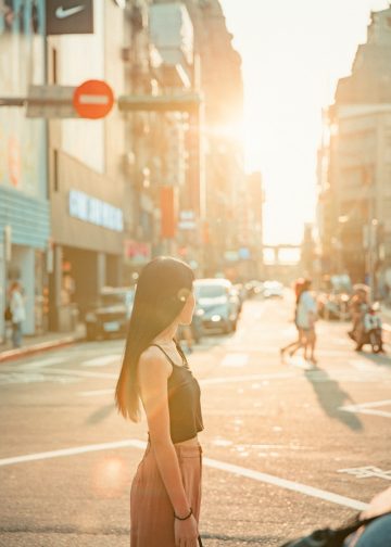 woman standing on road